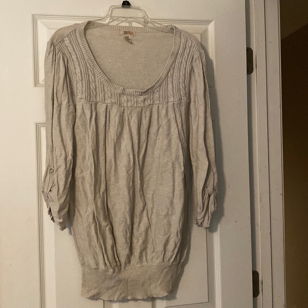 Tan sweater with neckline detailing